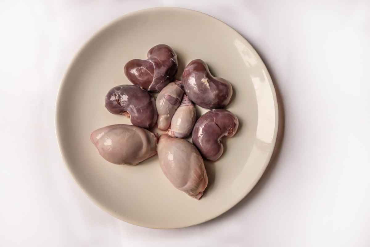 Plate of raw lamb kidneys and testicles, traditional Icelandic ingredients