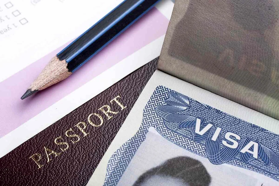 A close-up image showing the corner of a passport with the word 