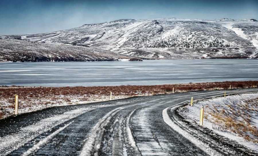 Secondary road covered in snow with beautiful landscape