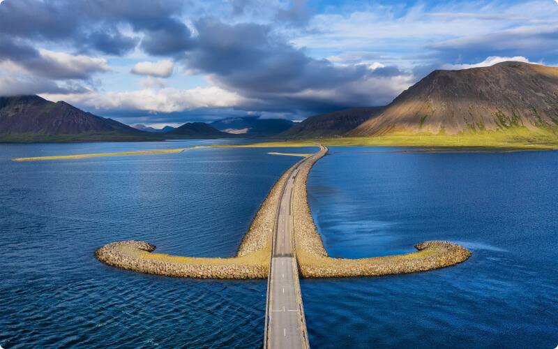 Icelandic road in the shape of a sword with impressive background