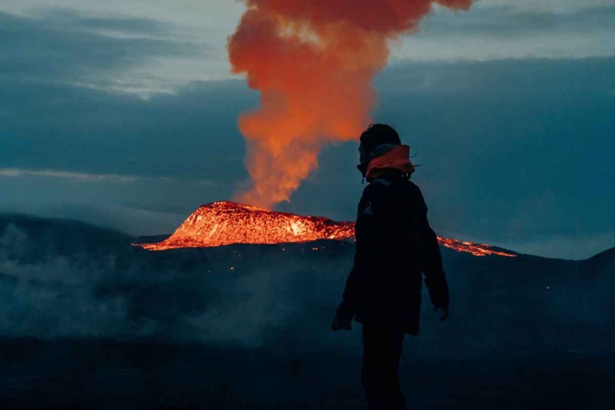 Tourist watching fagradalsfjall volcano eruption