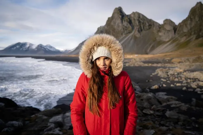 Tourist with a wind and waterproof jacket to tackle Iceland's winter