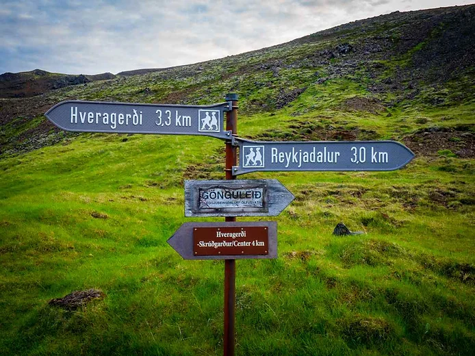 Reykjadalur hiking trail pole with directions