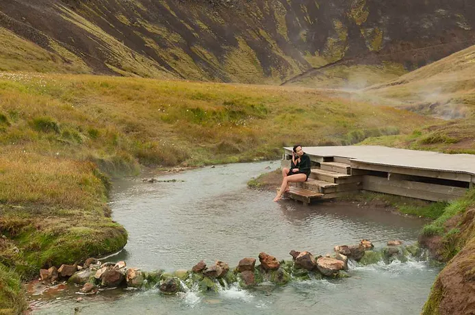 woman at Reykjadalur bathing area