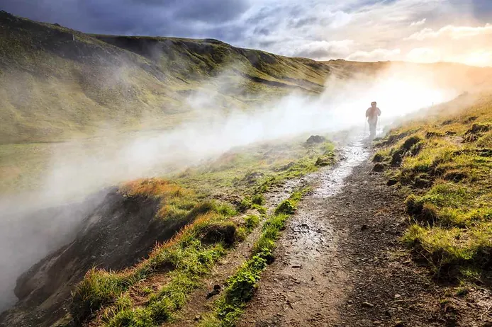 Relaxing in Reykjadalur Hot Springs with fog