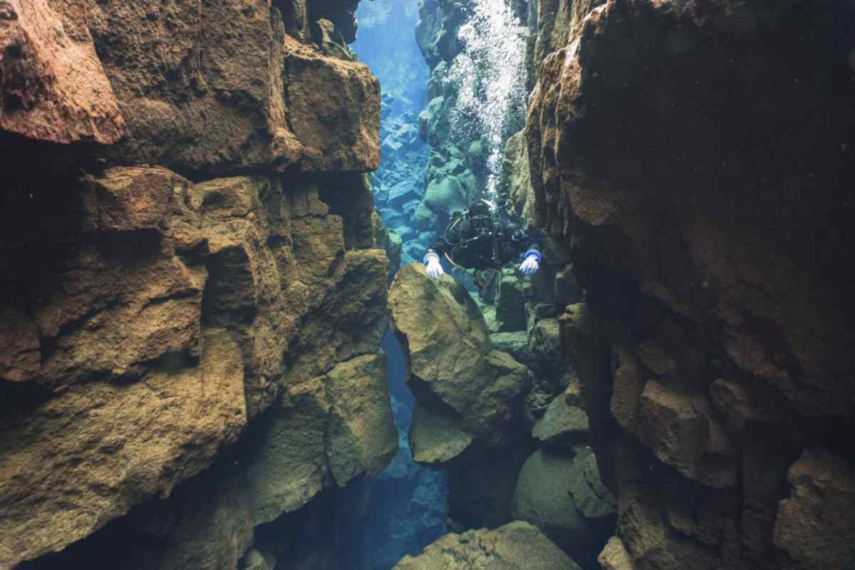 Diver between two continents in Silfra