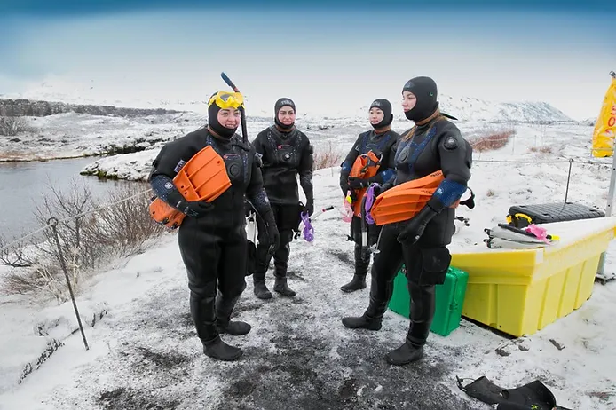 Tourists attending a Silfra snorkeling tours