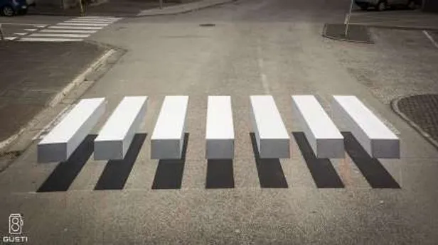 3D optical illusion crosswalk in Iceland designed to look like floating blocks.