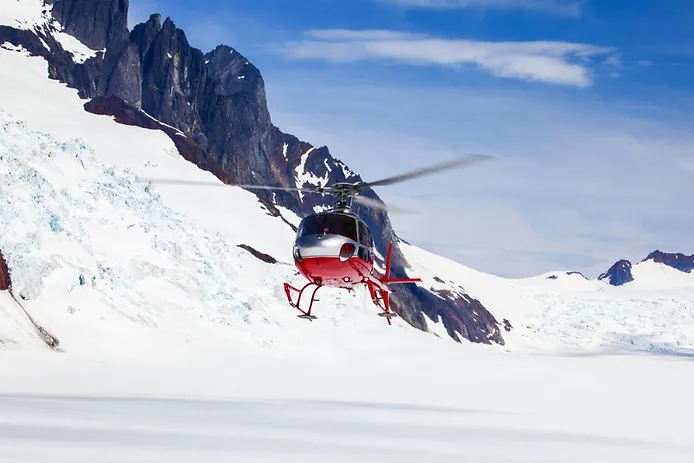 helicopter arriving at a heli-ski station in Iceland