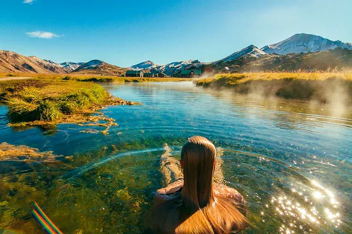 tourist enjoying the hot springs in Iceland