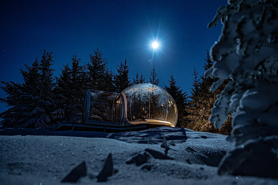 Bubble hotel in a snowy landscape