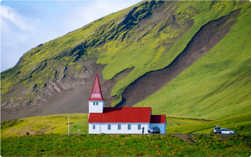 beautiful redroof church in the south coast of Iceland