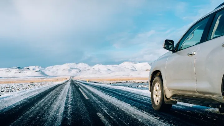 Cheap rental car on Iceland’s snowy road - One of the reasons to visit Iceland in the off-season