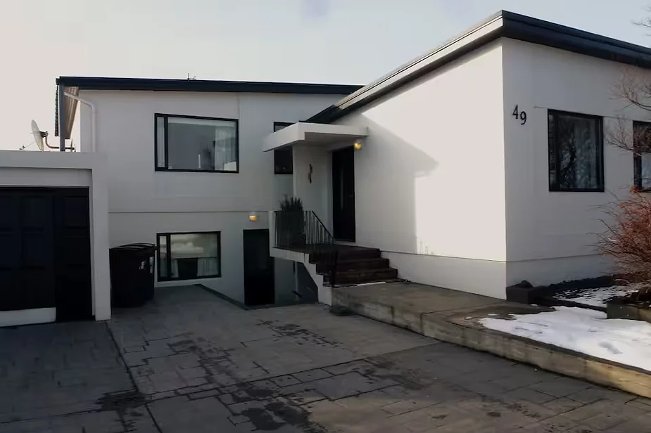 Modern luxury apartment in Keflavík, Iceland, featuring a private entrance, chic design, and close proximity to the Blue Lagoon and local amenities.