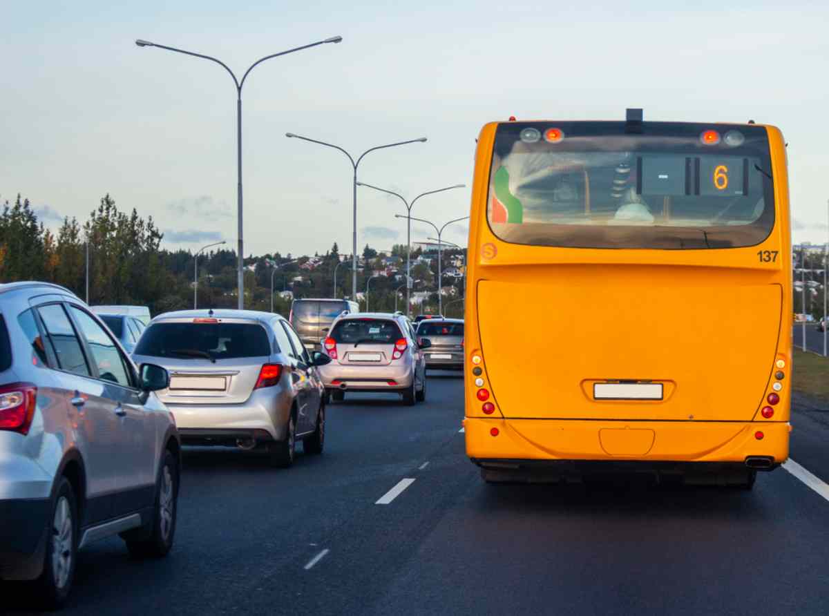 Yellow urban bus in the streets of Reykjavik