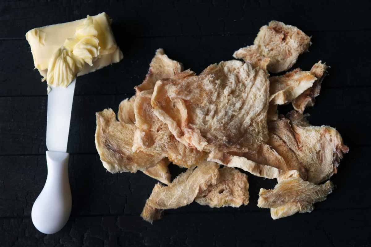 Icelandic dried fish cut into pieces with butter